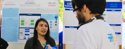 A student discusses a project at Partners' Day 2019